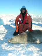 david shuman with sealion in antartica