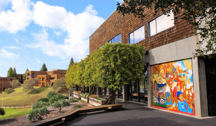 Oakes Mural displayed next to the café, Learning Center shown above.
